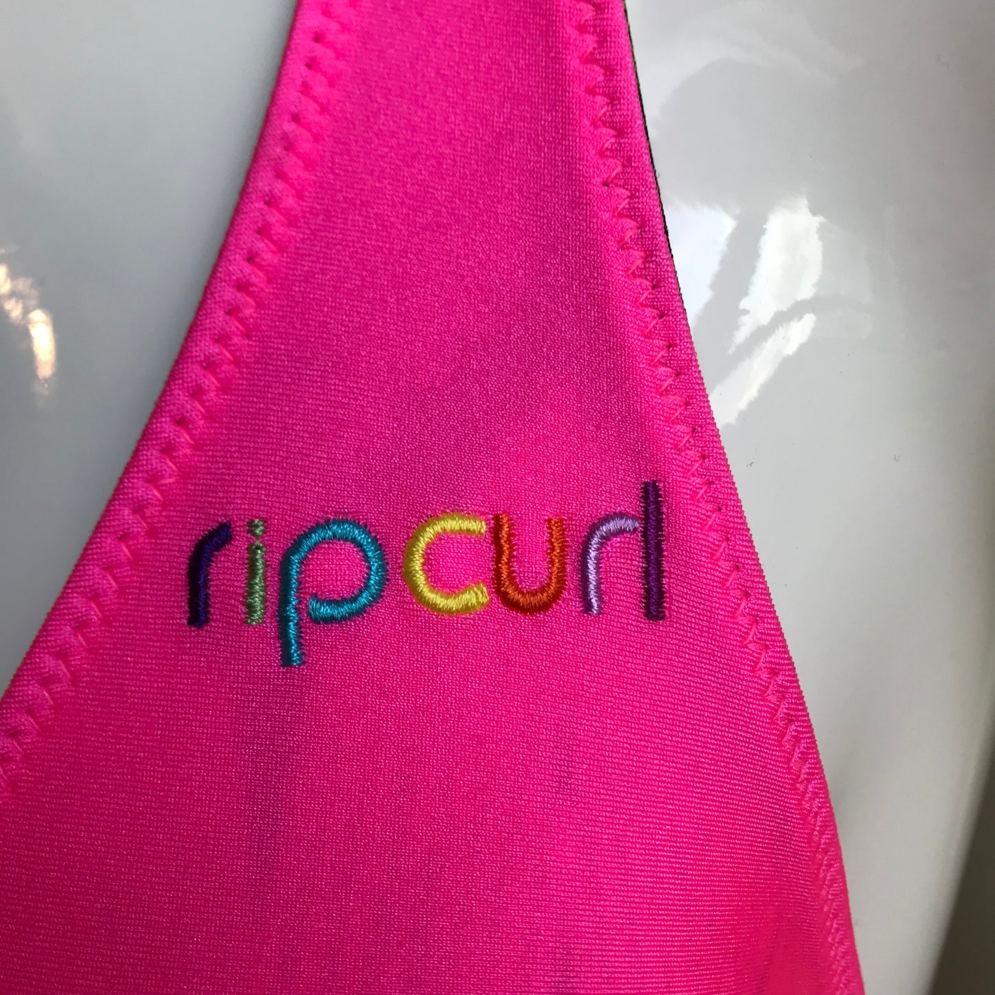 Rip Curl Swim multi color reversible neon pink solid halter bikini top