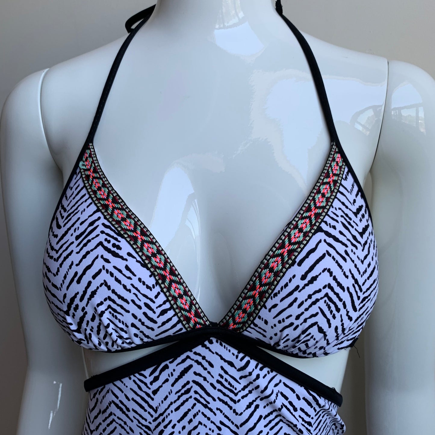 Hula Honey black & white apron style tankini top with push up padding