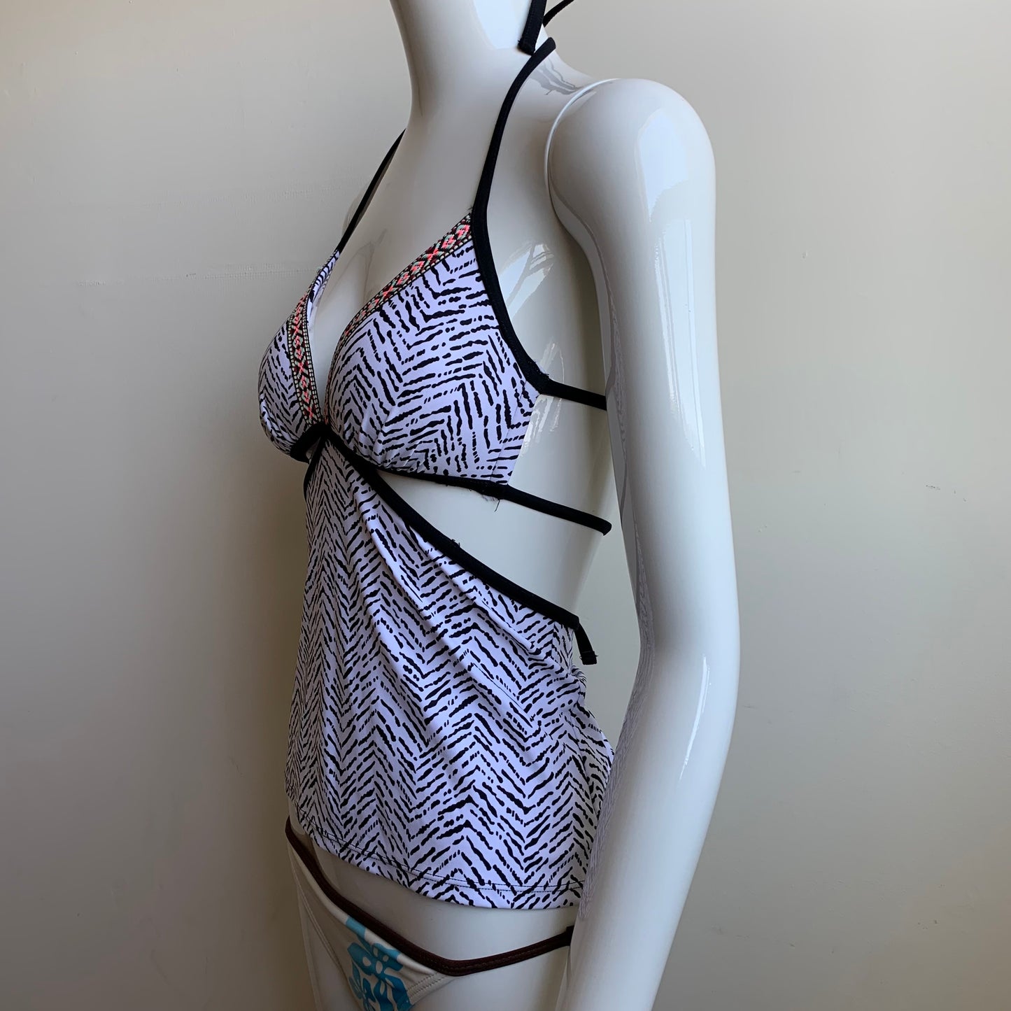 Hula Honey black & white apron style tankini top with push up padding