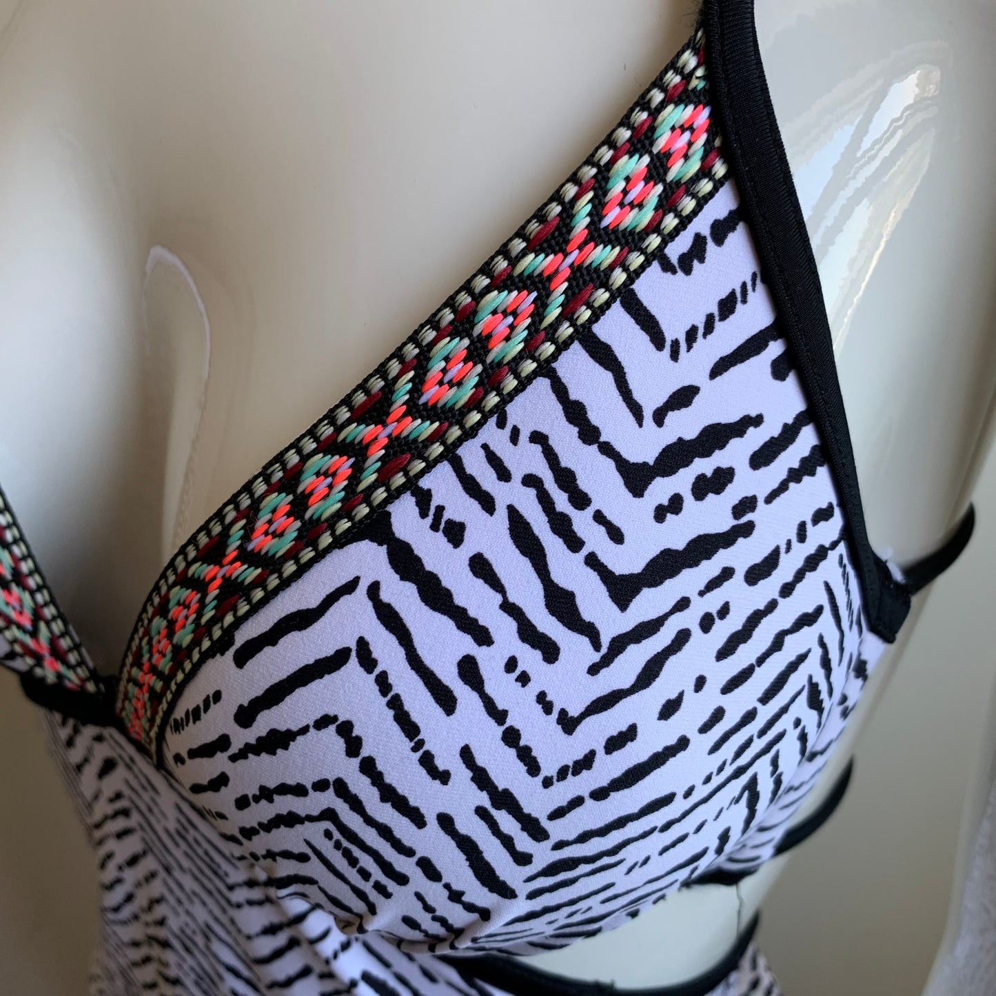 Hula Honey black & white apron style tankini top with push up padding
