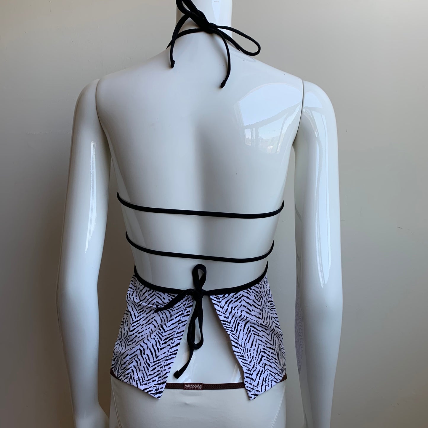 Hula Honey black & white apron style tankini top with push up padding