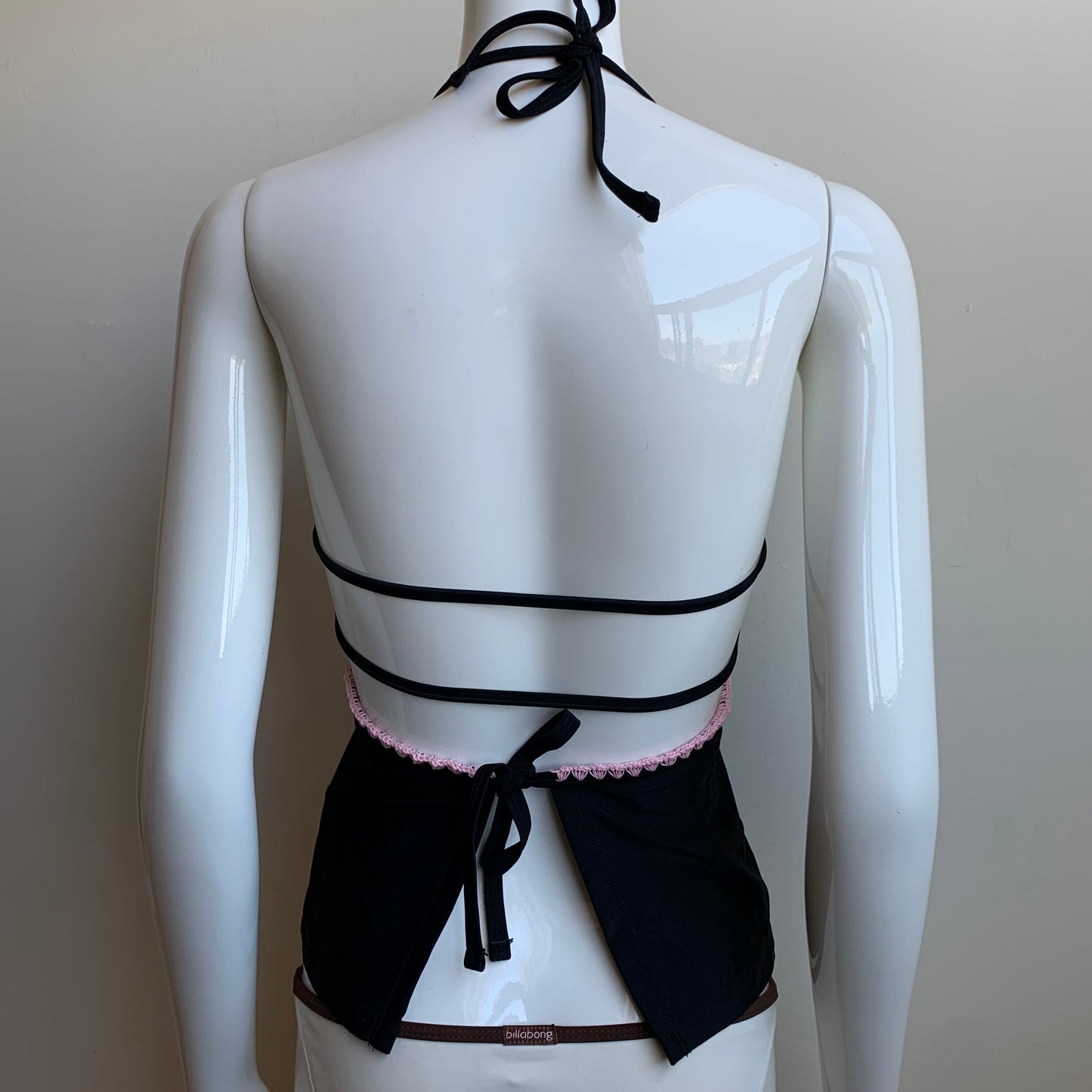 Hula Honey black pink stitch apron style tankini top with push up padding