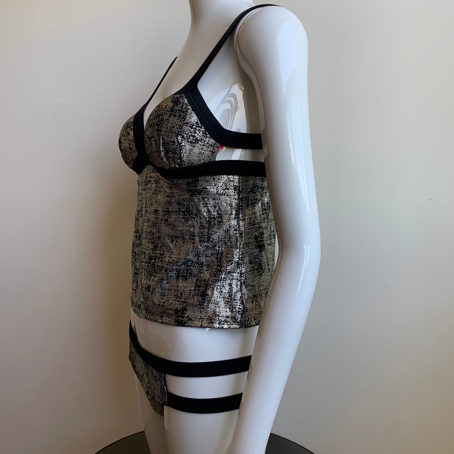 Hula Honey black & gold apron style tankini top with push up padding