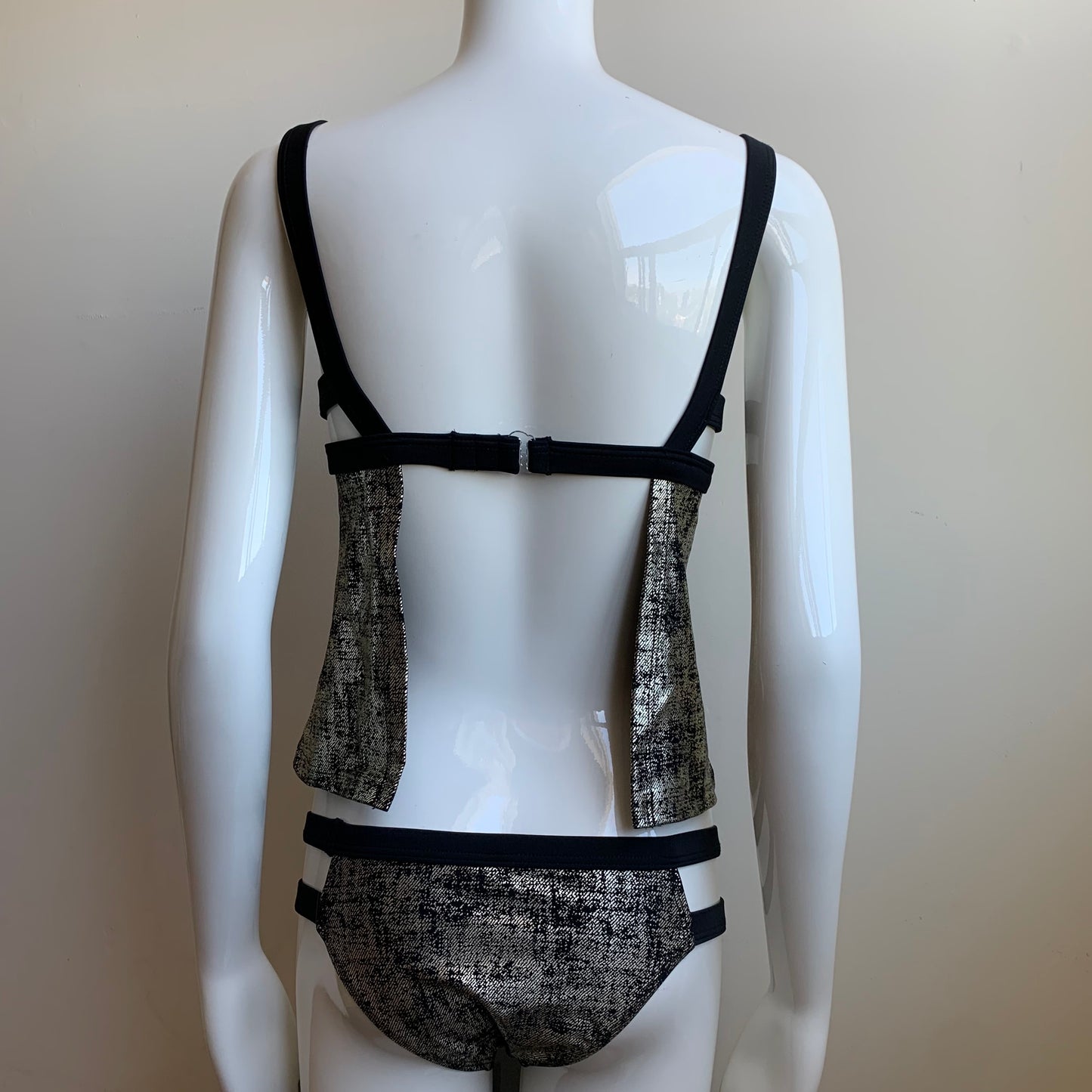 Hula Honey black & gold apron style tankini top with push up padding